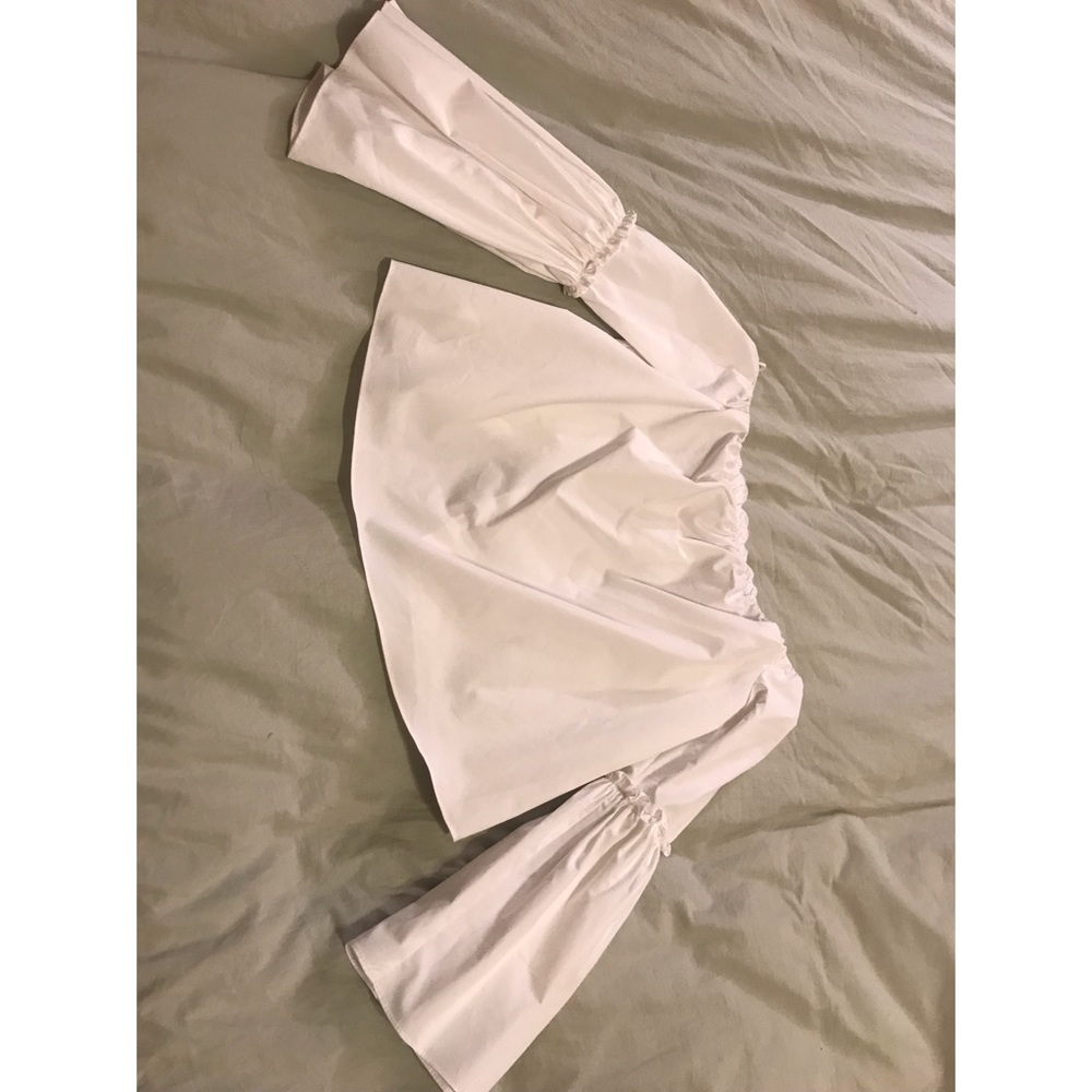 White bell sleeve top